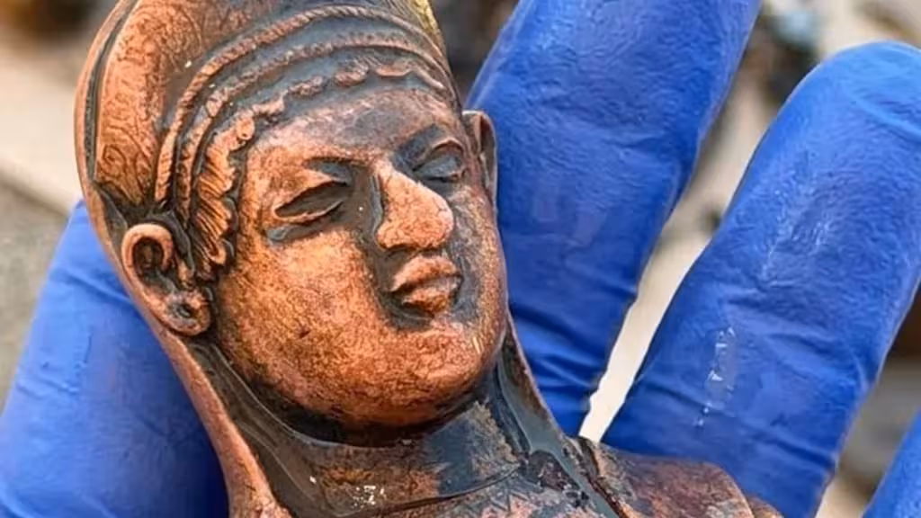 A Close Up View Of An Ancient Bronze Figurine