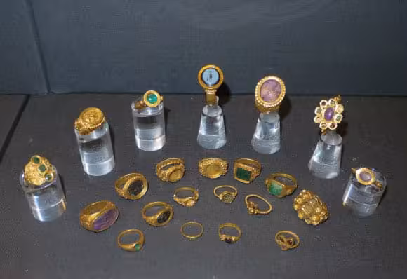 A Selection Of Gold Rings And Gemstone Jewelry From The Thetford Treasure