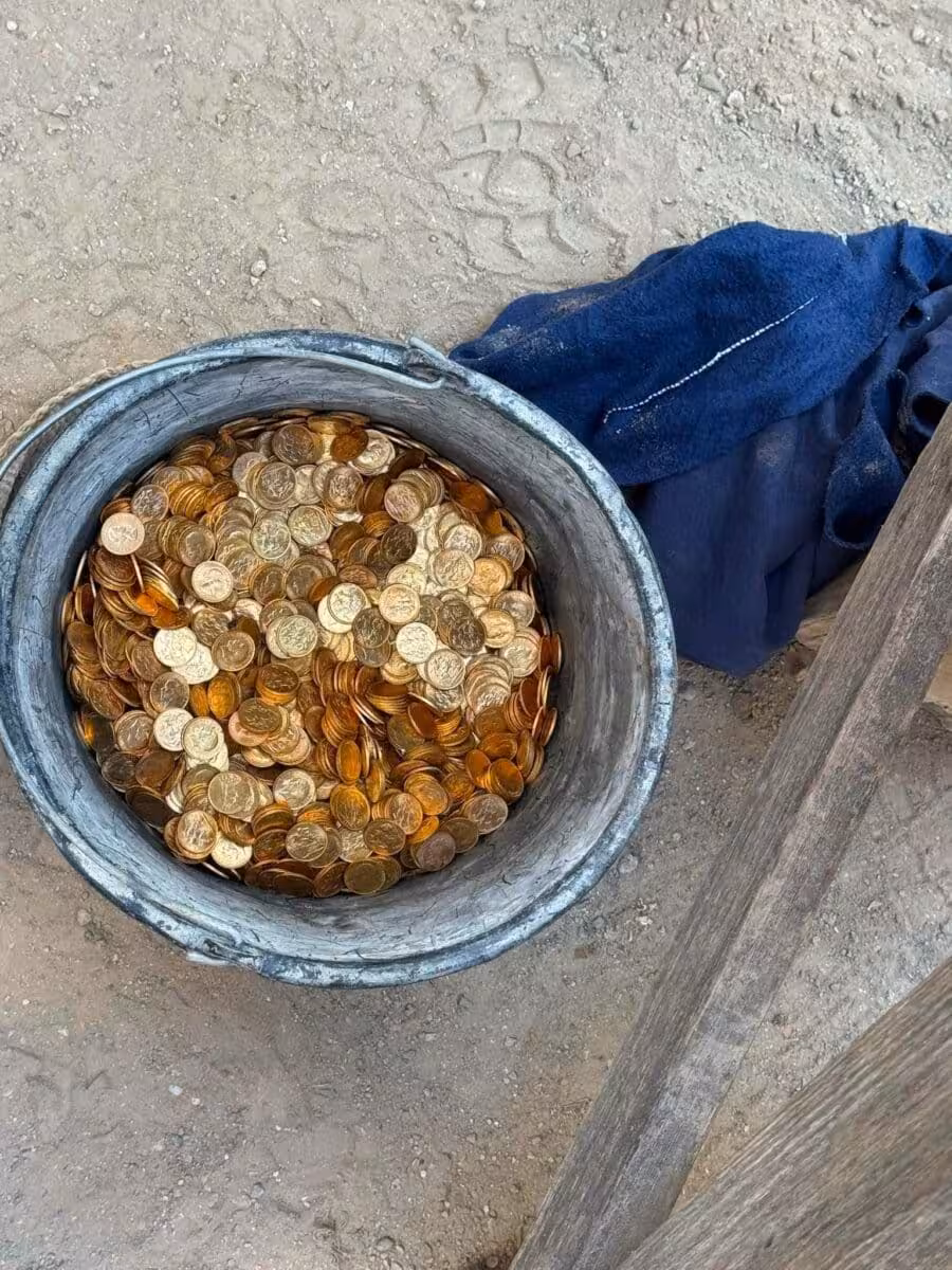 A Container Filled With Gold Coins