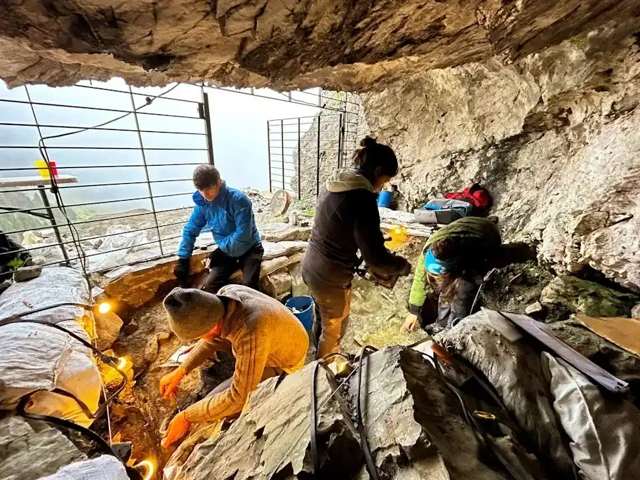 Fieldwork At Cave 338, Where Evidence Of Repeated Prehistoric Occupation Was Uncovered.