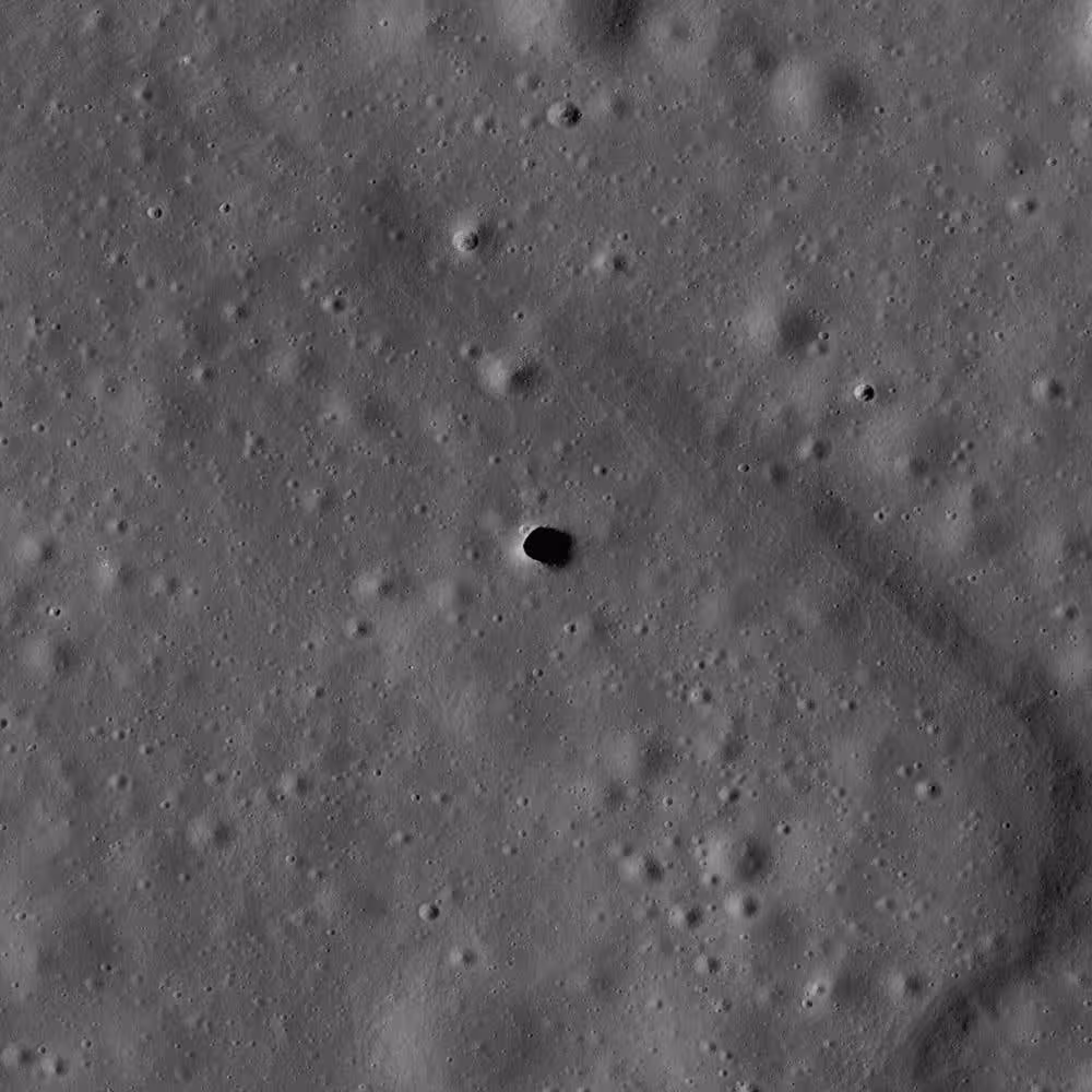 The Marius Hills Pit (MHP) on the surface of the Moon. MHP will be studied by PSI-led GIMLI, through the NASA PRISM program, to investigate a possible lava tube beneath the surface.
