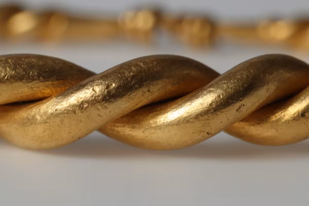 Close Up View Of A Viking Age Gold Bracelet From The Rold Treasure, Showing Its Twisted Craftsmanship.