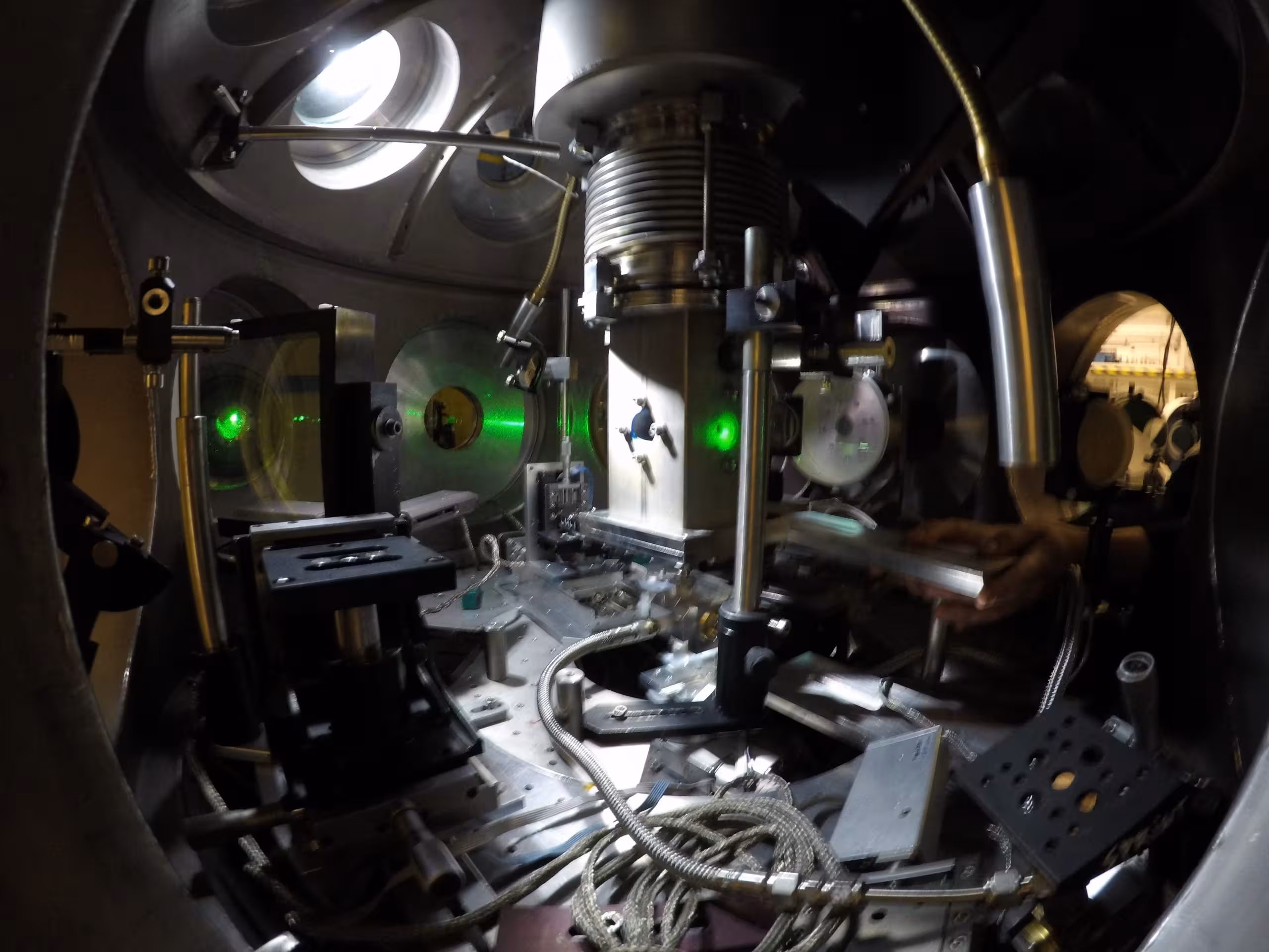 Inside of the vacuum target chamber where the plasmas are created, with, at the center, the magnetic field coil that allows to re-create the strong magnetic fields that are scaled to those of a young star.