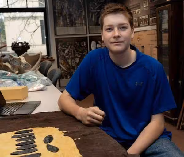 Joshua Fetter With The Ancient Tools He Discovered As A Child.