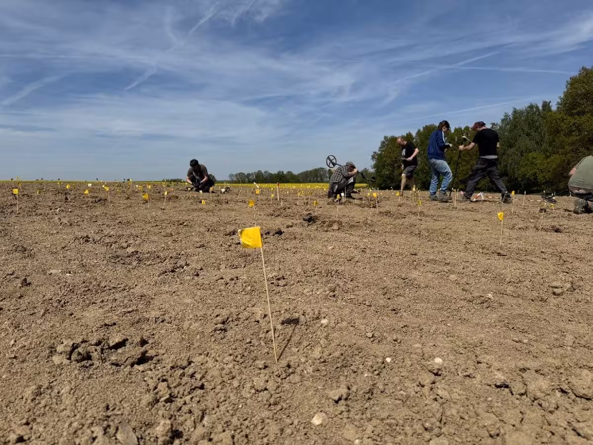 Archaeologists Survey The Field Where A Medieval Silver Coin Hoard Was Discovered Near Kutná Hora, Czech Republic.