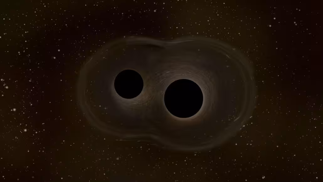 An illustration shows two black holes relatively close to each other against a starry space background.