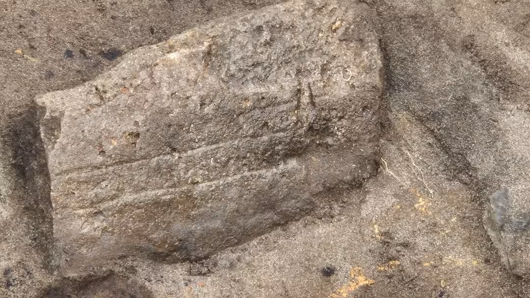 A Stone Fragment With Possible Markings Found At The Medieval Á Sondum Site.