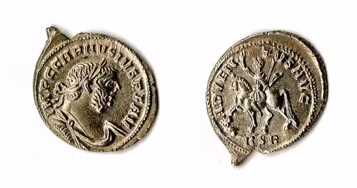A Silver Roman Coin Shows Emperor Carausius On One Side And A Mounted Figure On The Reverse