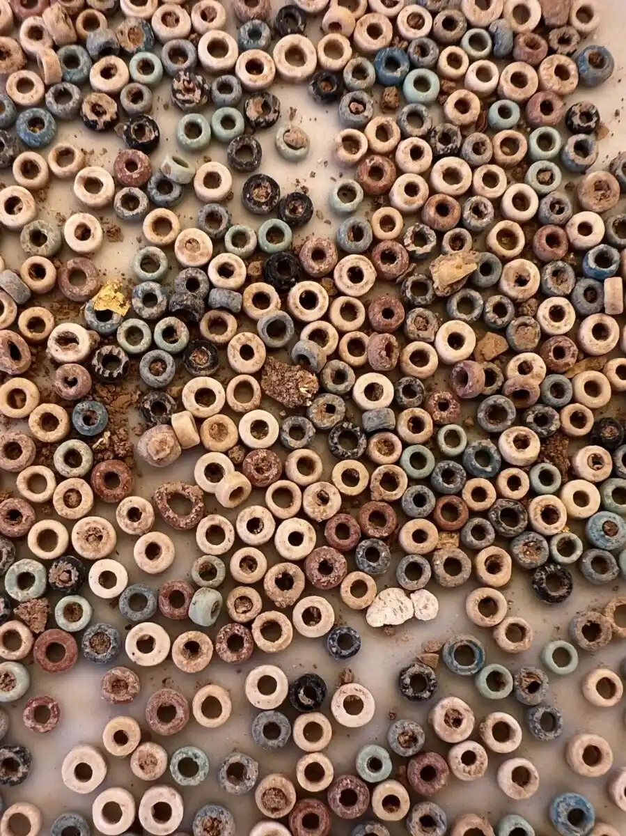 A Colorful Collection Of Ancient Beads Unearthed At An Archaeological Site