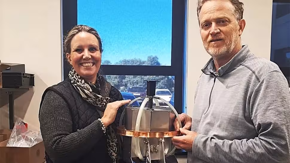 Africa2moon’s Carla Mitchell And Sarao Engineer Japie Ludick With A Tested Balls Sphere.