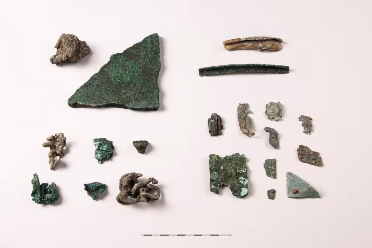 A Selection Of Metal Artifacts Recovered From The 2,300 Year Old Celtic Settlement At Allonnes, Including Bronze Fragments, Fittings, And Other Objects Uncovered During The Excavation.