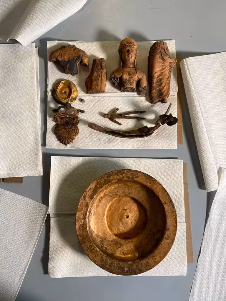 Ancient Bronze Artifacts, Including Figurines, Ornaments And Ritual Objects, Recovered During Archaeological Research.