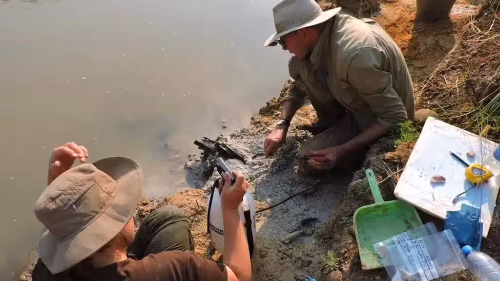 Prof Larry Barham Uncovering Prehistoric Wooden Objects On The Banks Of The River
