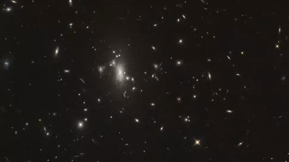The Galaxy Cluster Macs J0417 Observed By The Hubble Space Telescope