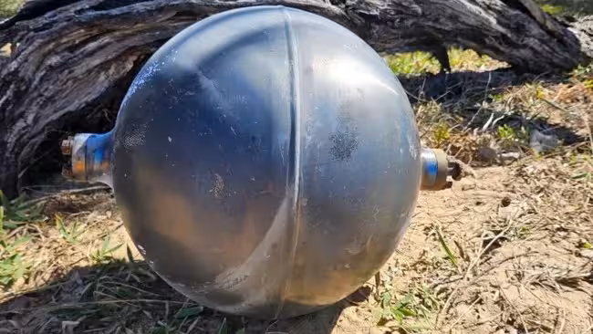 One Of The Metallic Spheres Discovered On An Australian Beach