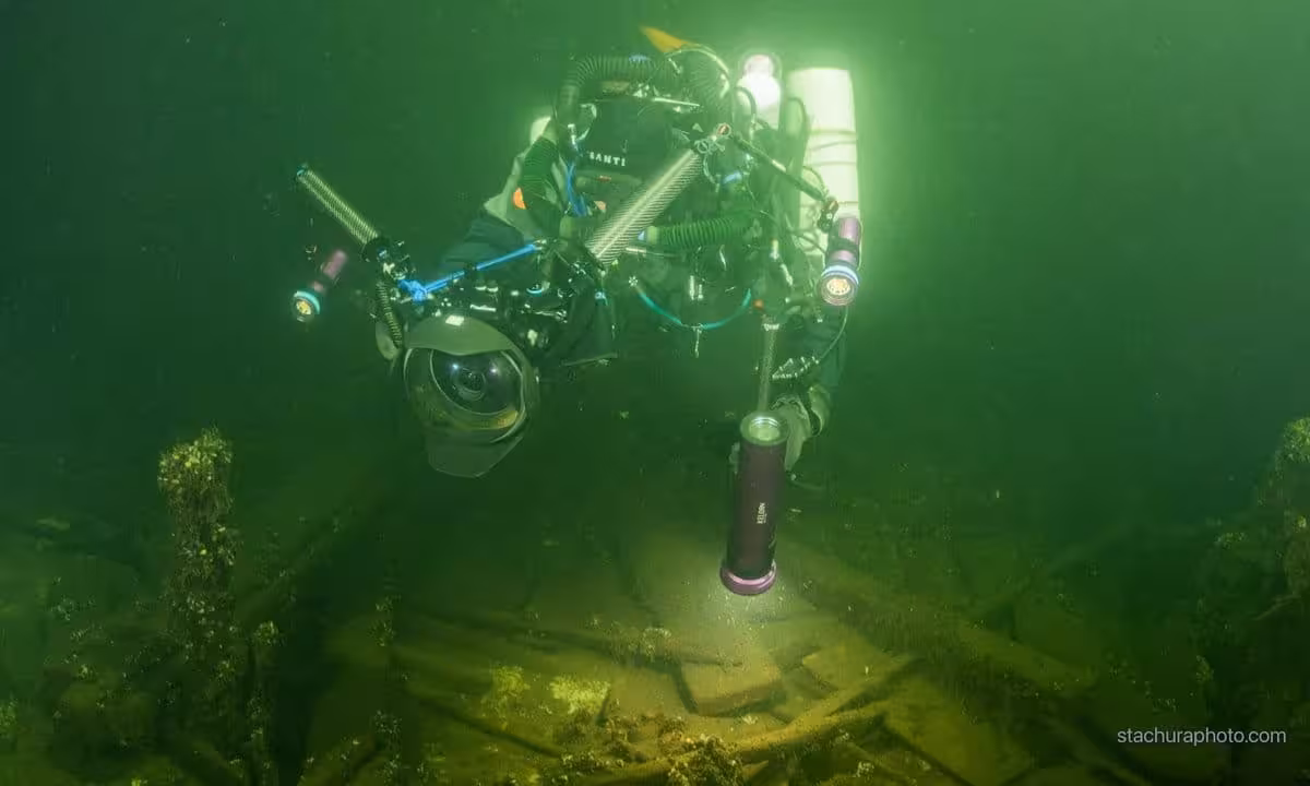One Of The Polish Divers Exploring The Sunken Vessel
