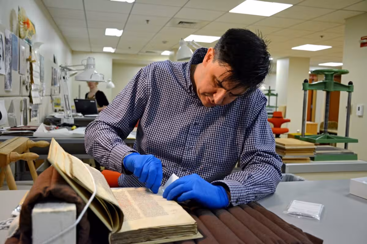 Tim Stinson Performs Nondestructive Dna Sampling On A Historic Manuscript.