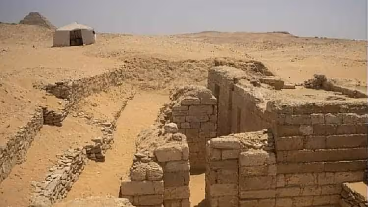 Remains Of An Old Kingdom Tomb Emerging From The Sands Of Saqqara, Egypt.