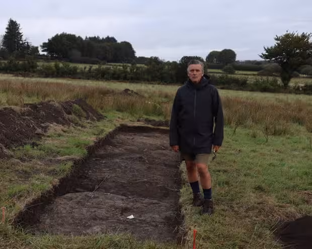 Mark Merrony Standing Near The Remains Of The Roman Fort’s Headquarters.