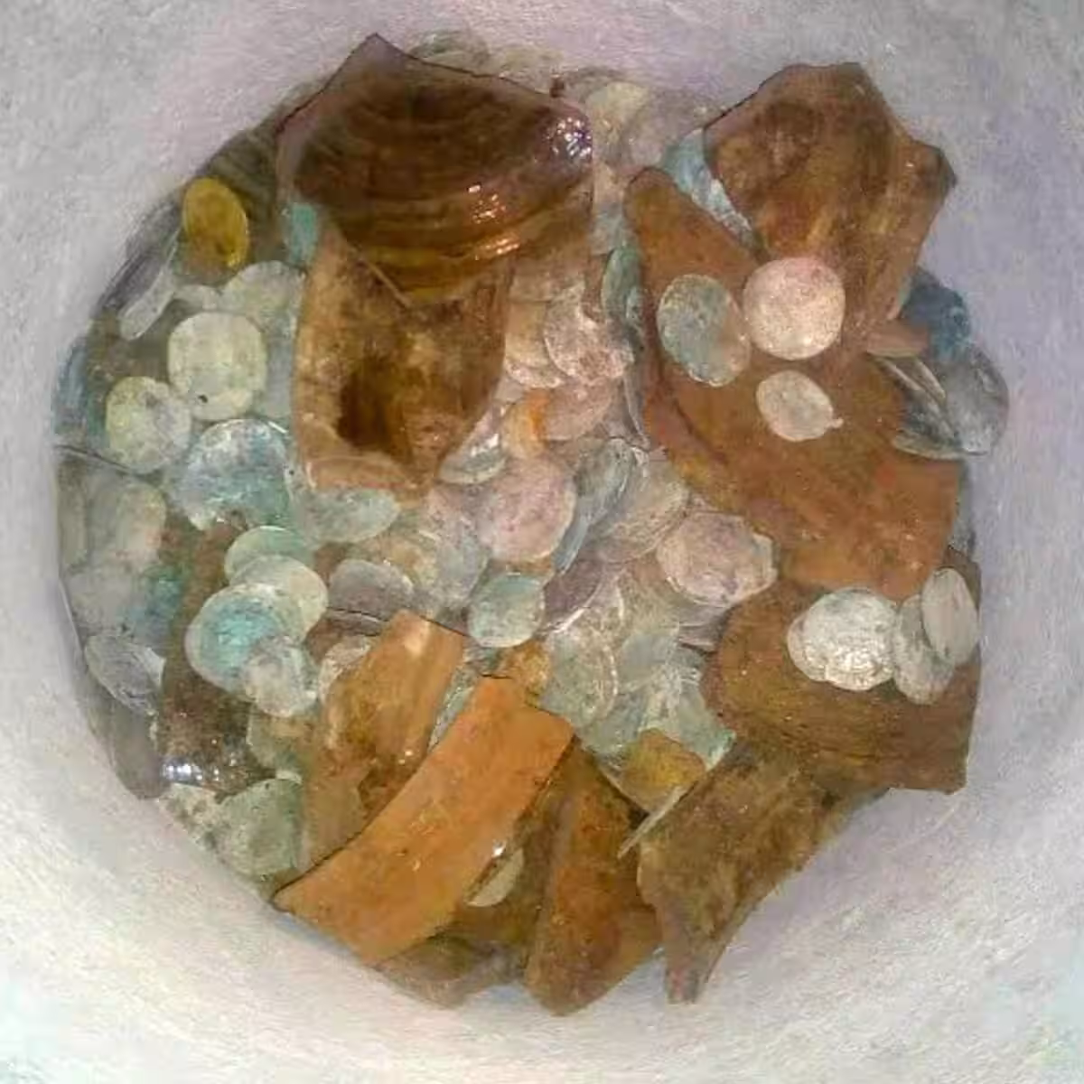 The Coins Were Found In A Smashed Jar