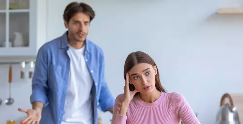 Couple,in,conflict,while,discussing,issues,in,a,kitchen,during