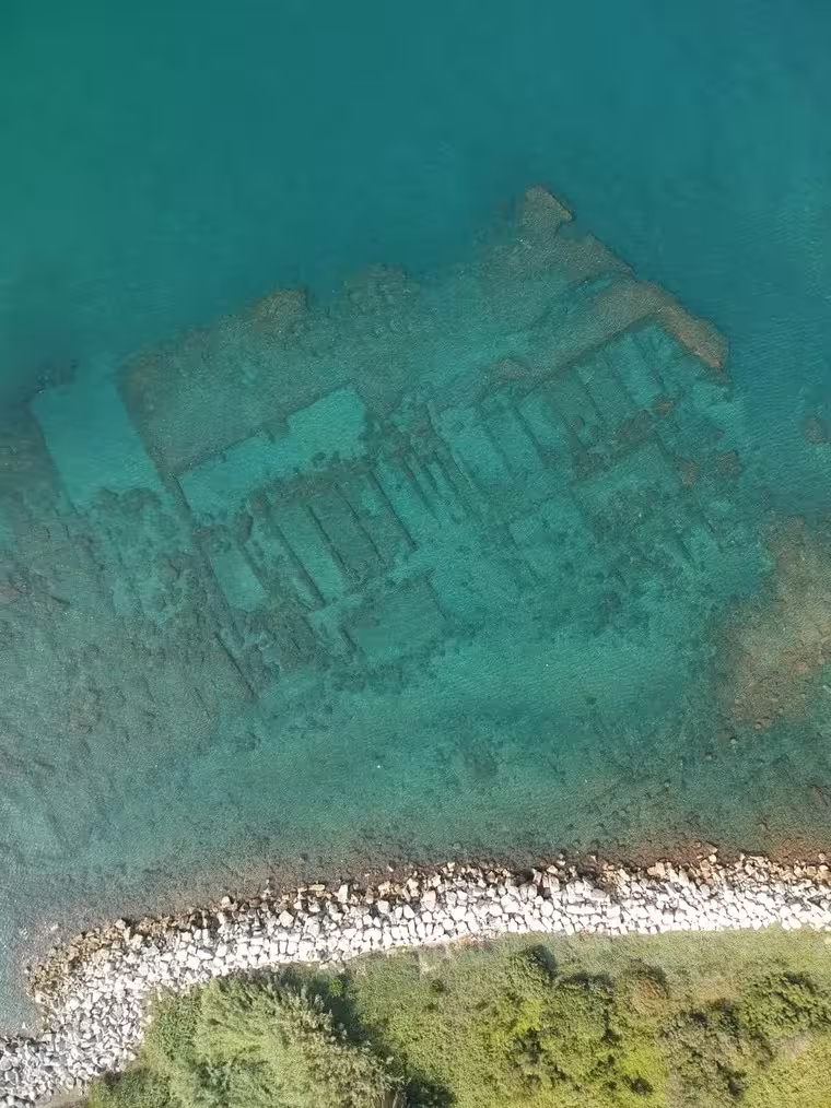 Aerial Photograph Of The Submerged Roman Waterfront Of Puteoli, Once The Most Important Port Of The Roman Empire.