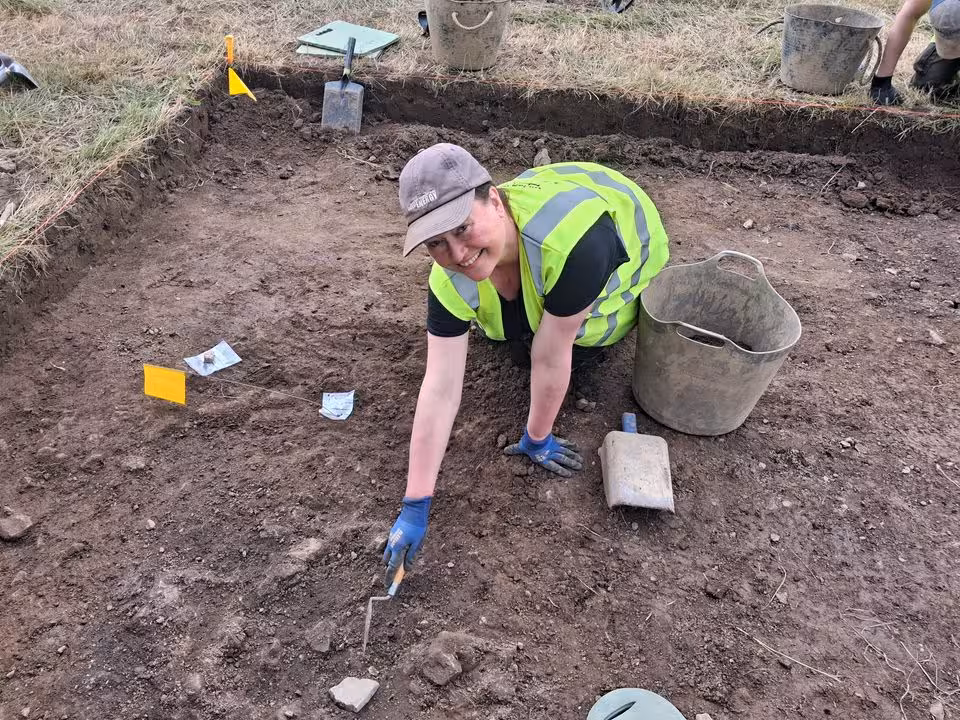 Archaeologist Hilde Fyllingen Points To Fragments Of A Norwegian Soapstone Vessel Recently Found.