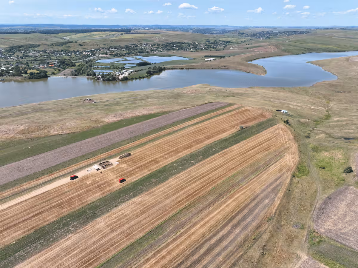 Aerial Photograph Of The Promontory With The Reservoir At The Bottom Of The Slopes