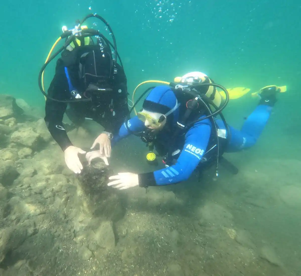 Archaeological Divers Investigate Submerged Remains At The Gran Carro di Bolsena Site In Italy’s Lake Bolsena.