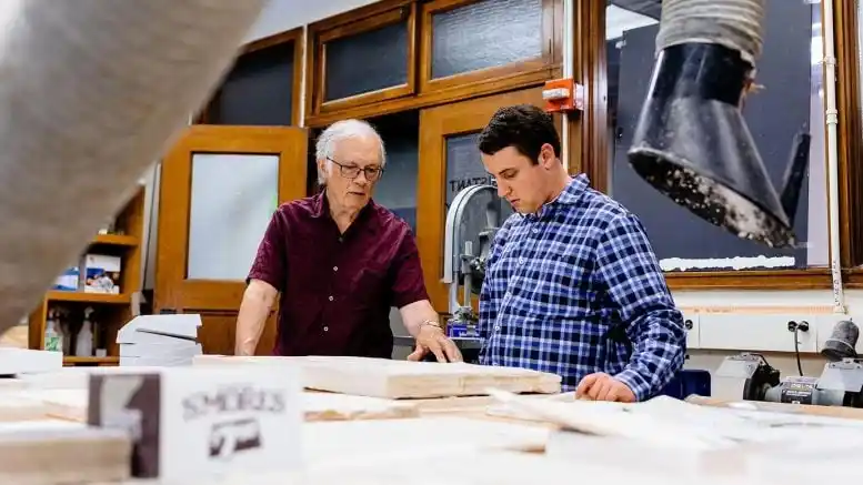 Lance Grande (left) And Gabe Robinson Examine The Gar Skull Fossil Discovered In Wyoming.