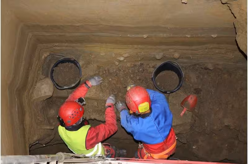 Excavation Team At Work Inside The Norwegian Cave Site.
