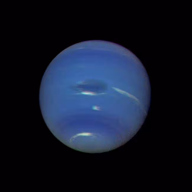 Voyager 2’s View Of Neptune’s Blue Green Atmosphere.