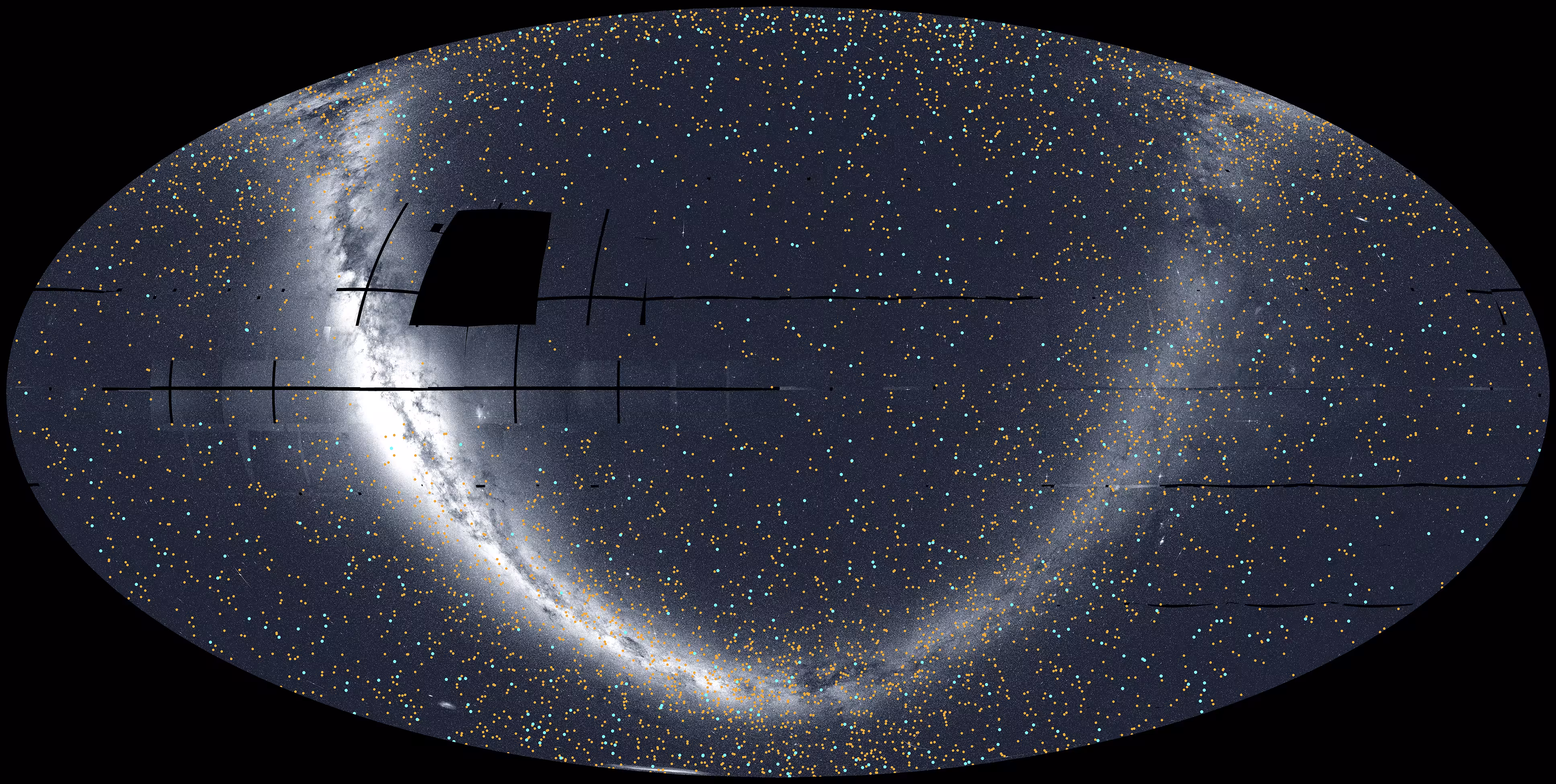 This view of the whole sky was constructed from 96 TESS sectors. By the end of September 2025, when the last image of this mosaic was captured, TESS had discovered 679 exoplanets (blue dots) and 5,165 candidates (orange dots). The glowing arc running through the center is the plane of the Milky Way. The Large Magellanic Cloud can be seen along the bottom edge just left of center. Black areas within the oval indicate regions TESS has not yet imaged.
NASA/MIT/TESS and Veselin Kostov (University of Maryland College Park) This view of the whole sky was constructed from 96 TESS sectors. By the end of September 2025, when the last image of this mosaic was captured, TESS had discovered 679 exoplanets (blue dots) and 5,165 candidates (orange dots). The glowing arc running through the center is the plane of the Milky Way. The Large Magellanic Cloud can be seen along the bottom edge just left of center. Black areas within the oval indicate regions TESS has not yet imaged.
NASA/MIT/TESS and Veselin Kostov (University of Maryland College Park)