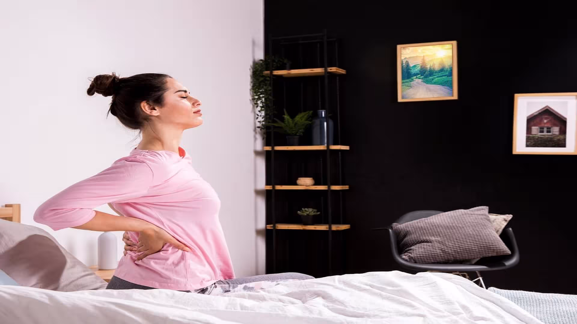 Female Having Back Pain During Postpartum Recovery