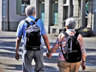 A senior couple walking