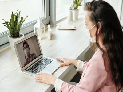 Woman participates in video chat.