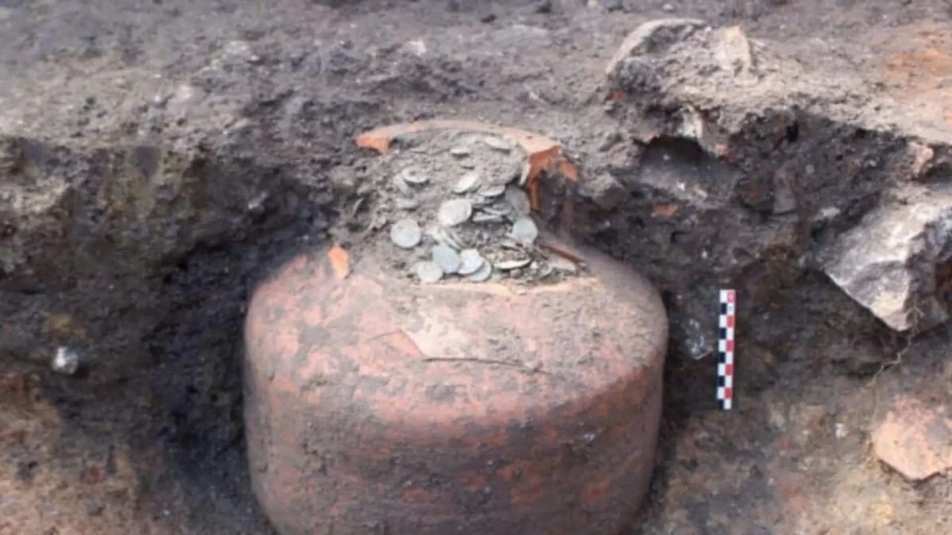 Archaeologists Unearthed A Year Old Jar Packed With Tens Of Thousands Of Roman Coins Hidden Beneath A French Village Scaled
