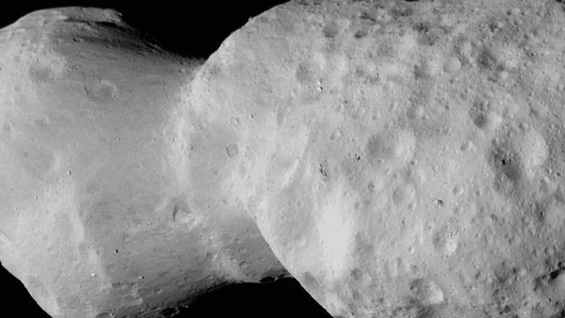 Nasas Lucy Spacecraft Uncovers Violent Birth Of Peanut Shaped Asteroid Scaled