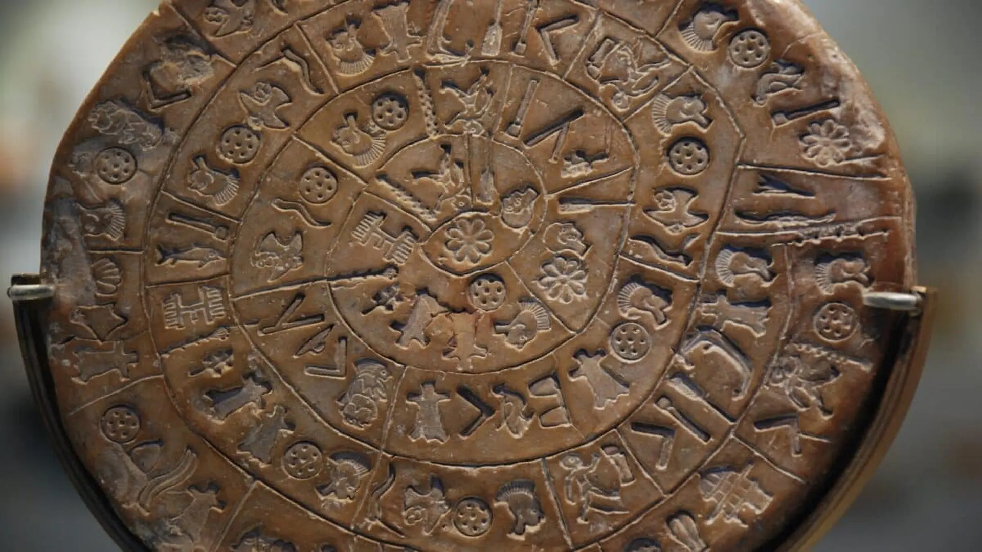 A Close Look To Phaistos Disc In Heraklion Archaeological Museum Scaled