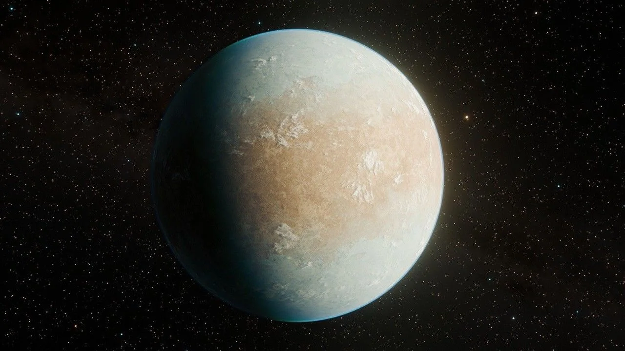 An artist’s impression of exoplanet HD 137010 b, depicting a rocky, Earth-sized sphere with tan surfaces and wispy white clouds or ice against a vast, dark background filled with distant stars.
