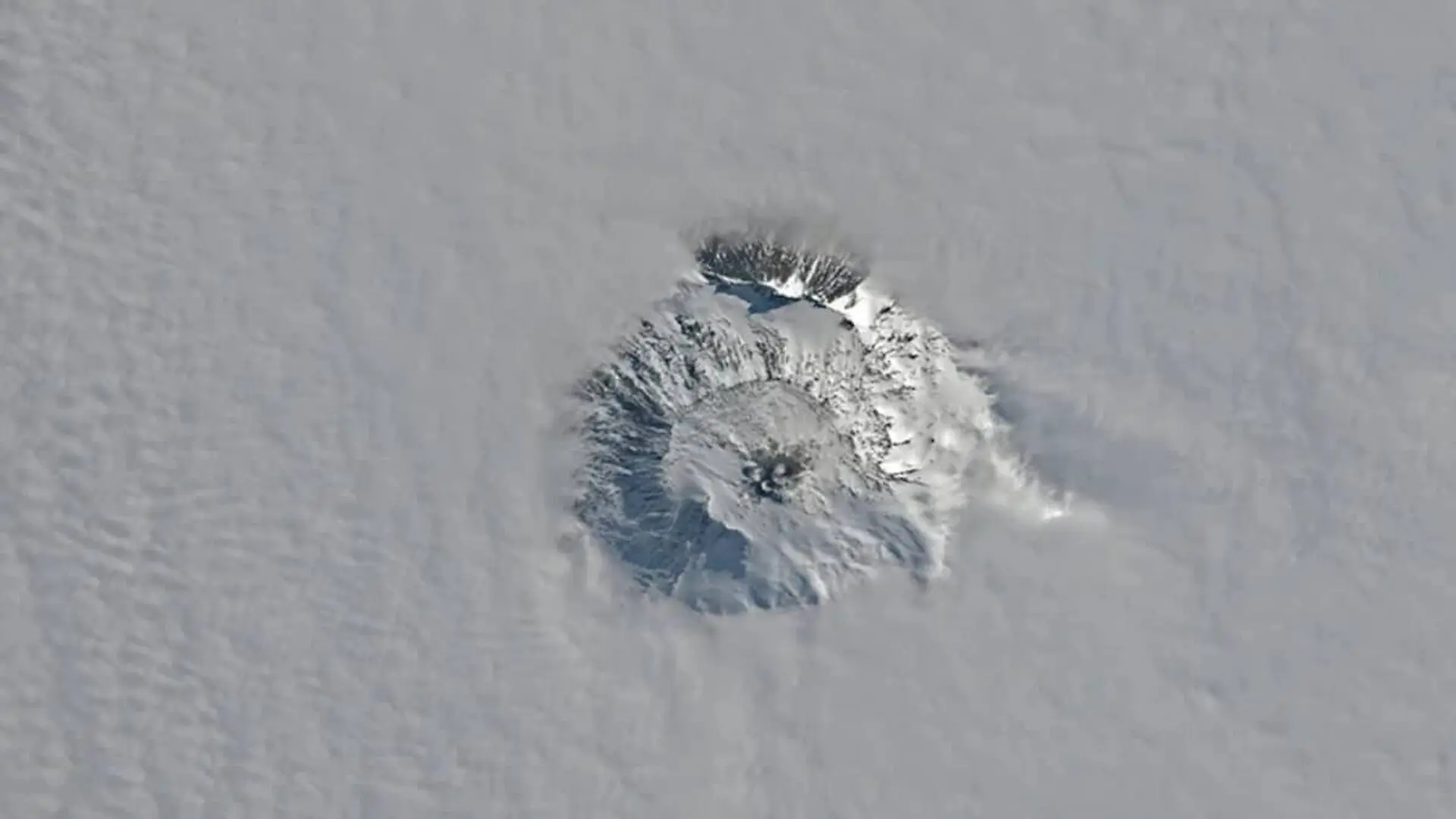 Satellite View Of Erebus With The Summit And Upper Flanks Visible Above The Surrounding Weather Clouds On 25 November Scaled