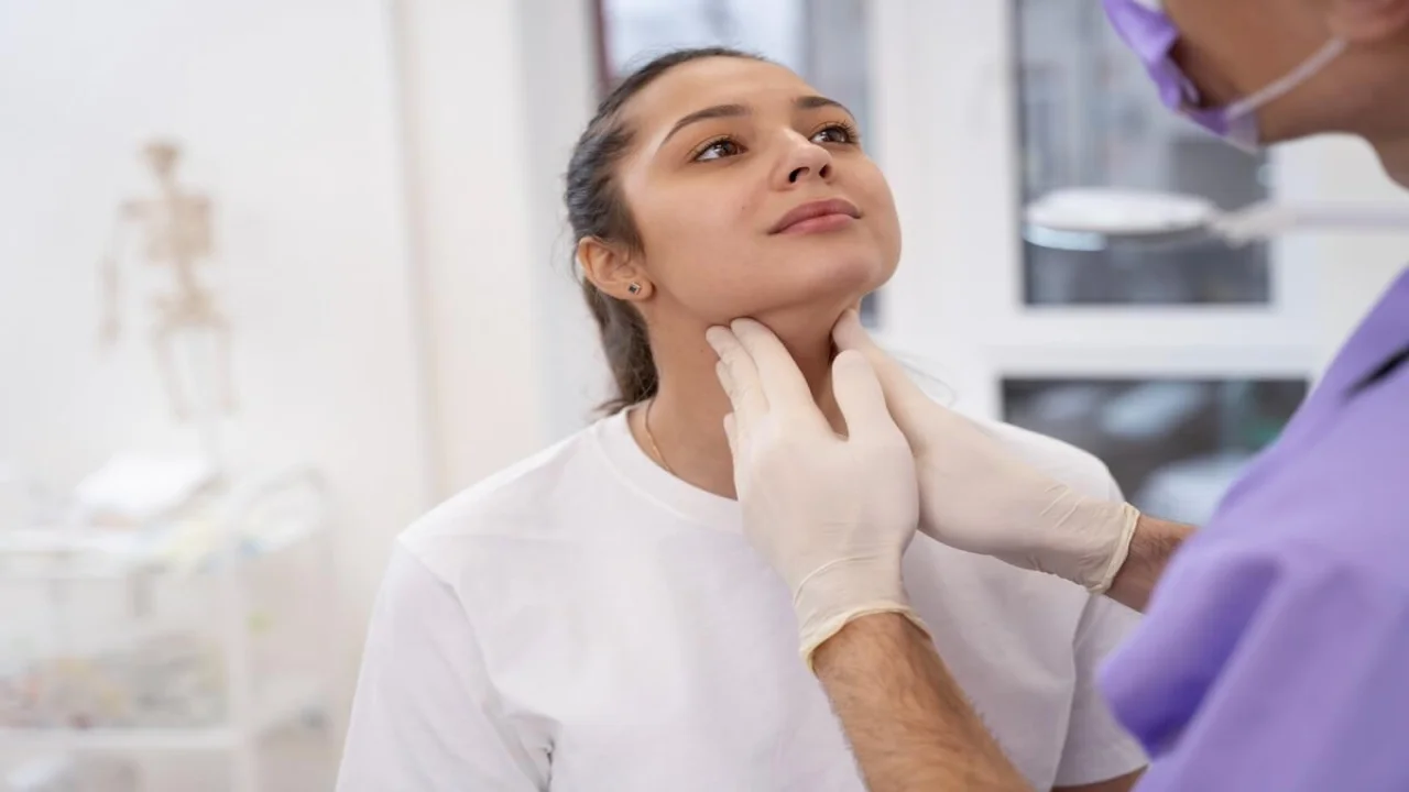 Doctor performing routine medical checkup.