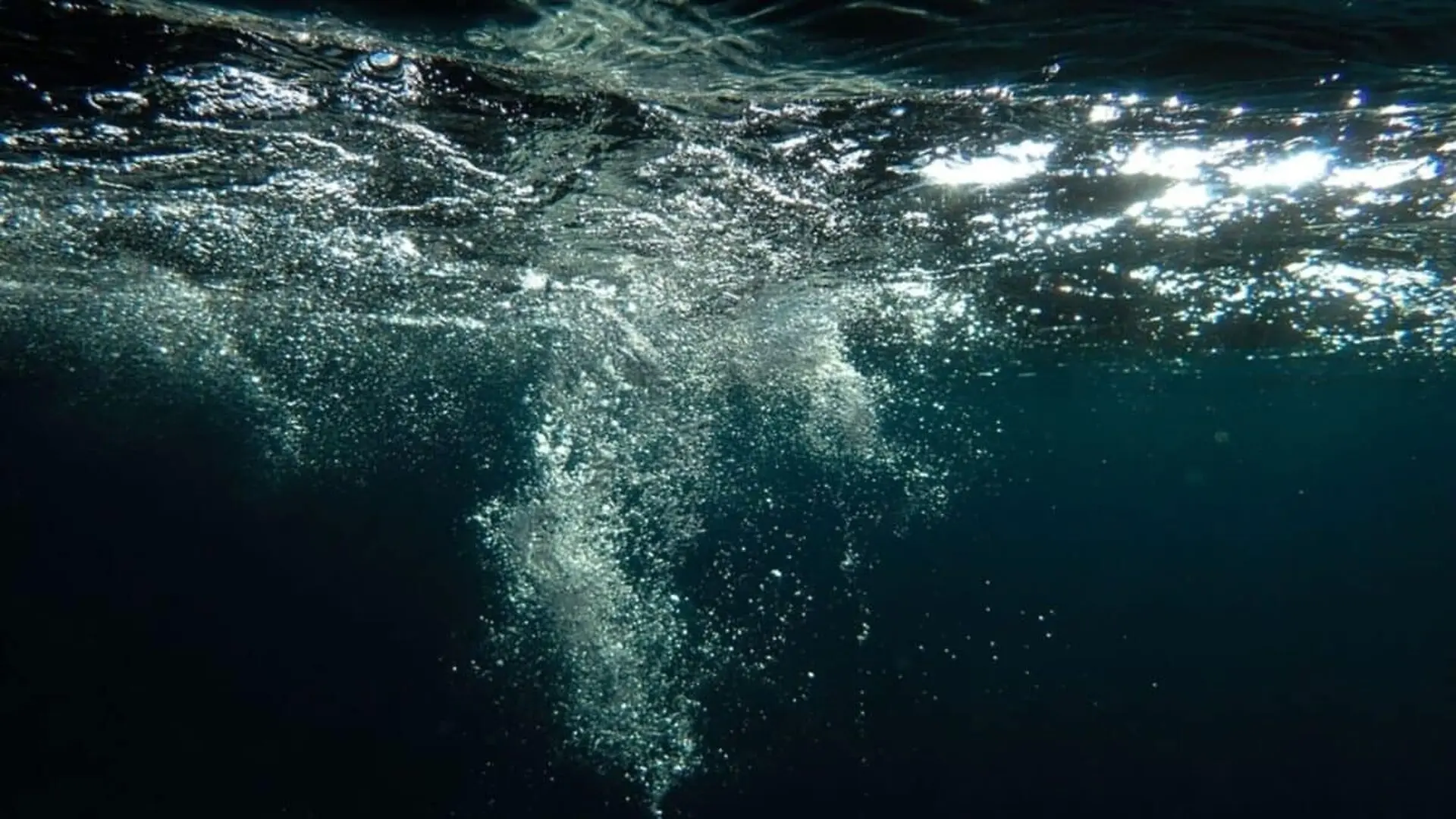 Underwater Air Bubbles Rising To The Surface Scaled
