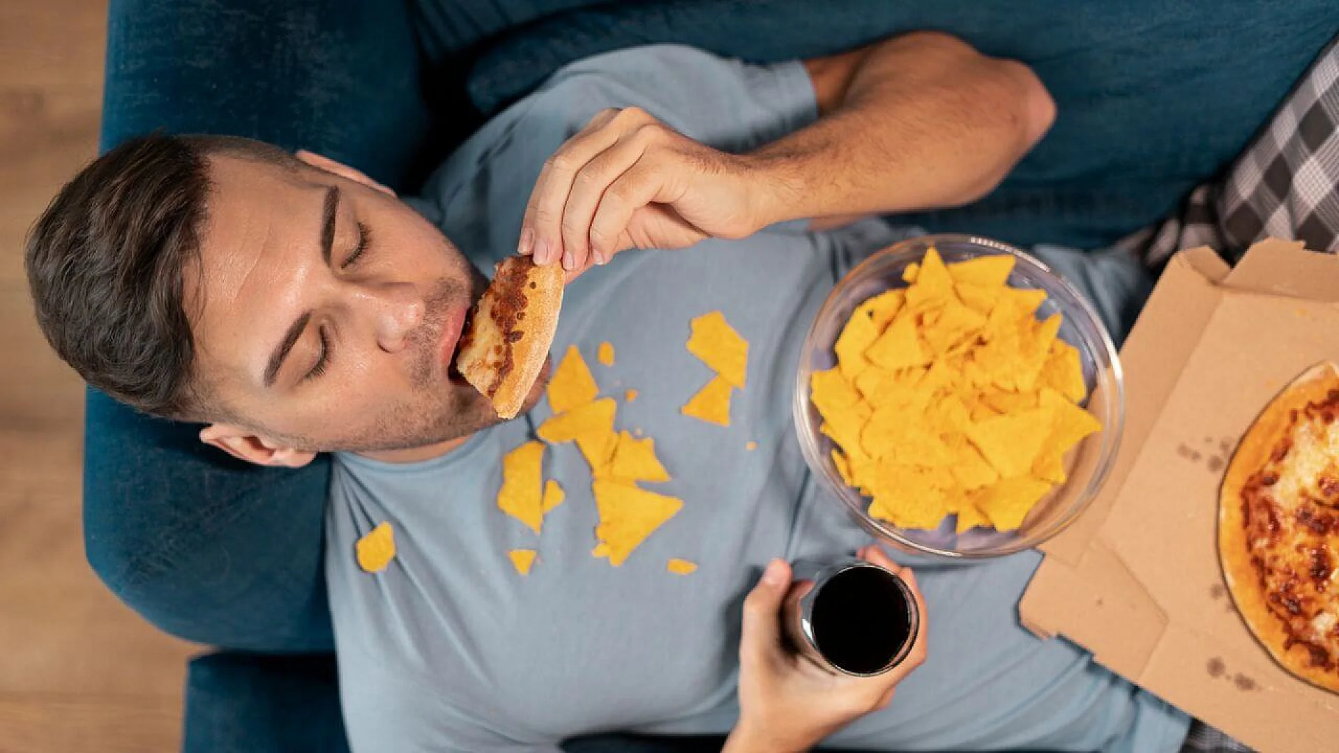 Person with eating disorder trying to eat fast food.