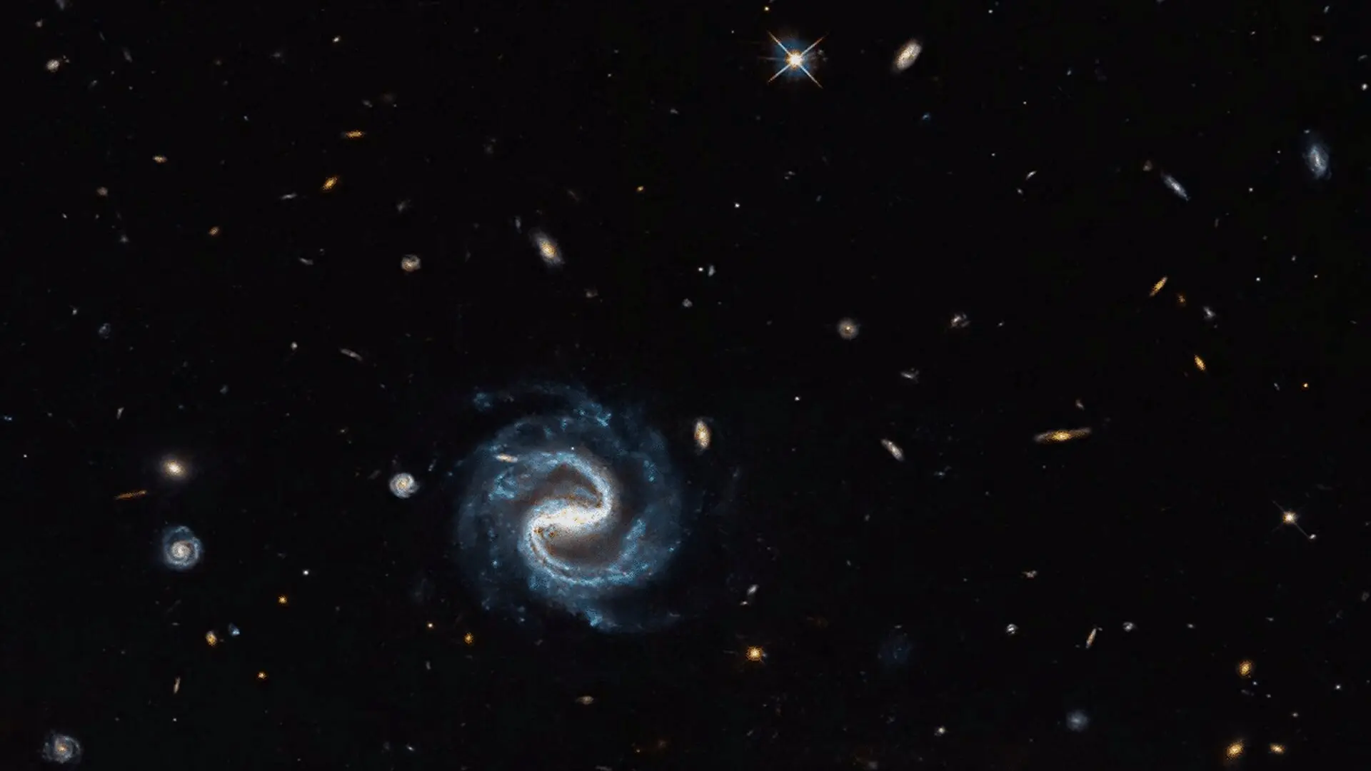 Nasas Hubble Spots A Cosmic Illusion That Could Reveal The Universes Hidden Matter Scaled