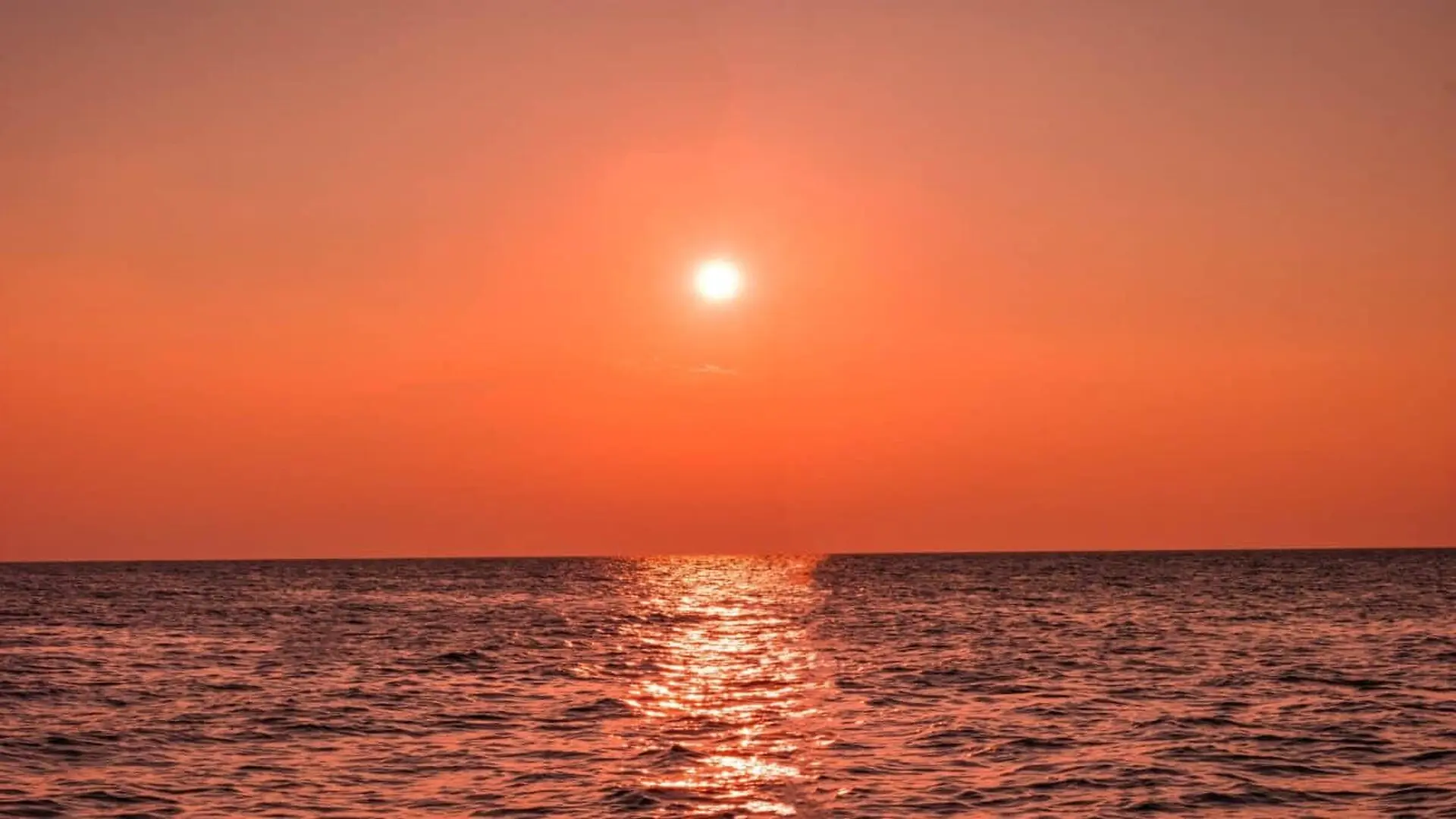 Sunset In The Gulf Of Mexico With Orange Colors Scaled