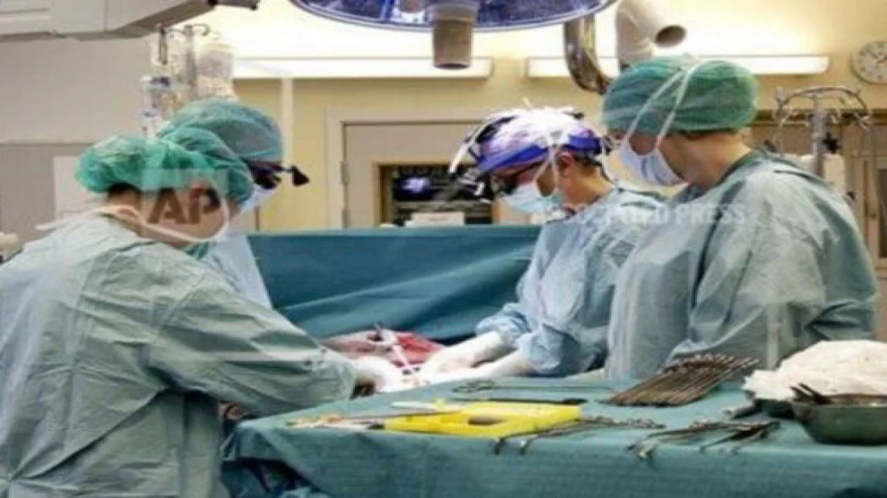FILE - In this April 4, 2012 photo made available by the University of Goteborg in Sweden, the Swedish research team practices before the operations to transplant wombs at the Sahlgrenska Hospital in Goteborg, Sweden.
