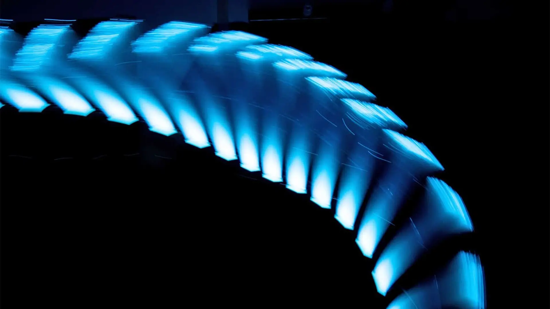 Blue sections form a column that bends on a black background.