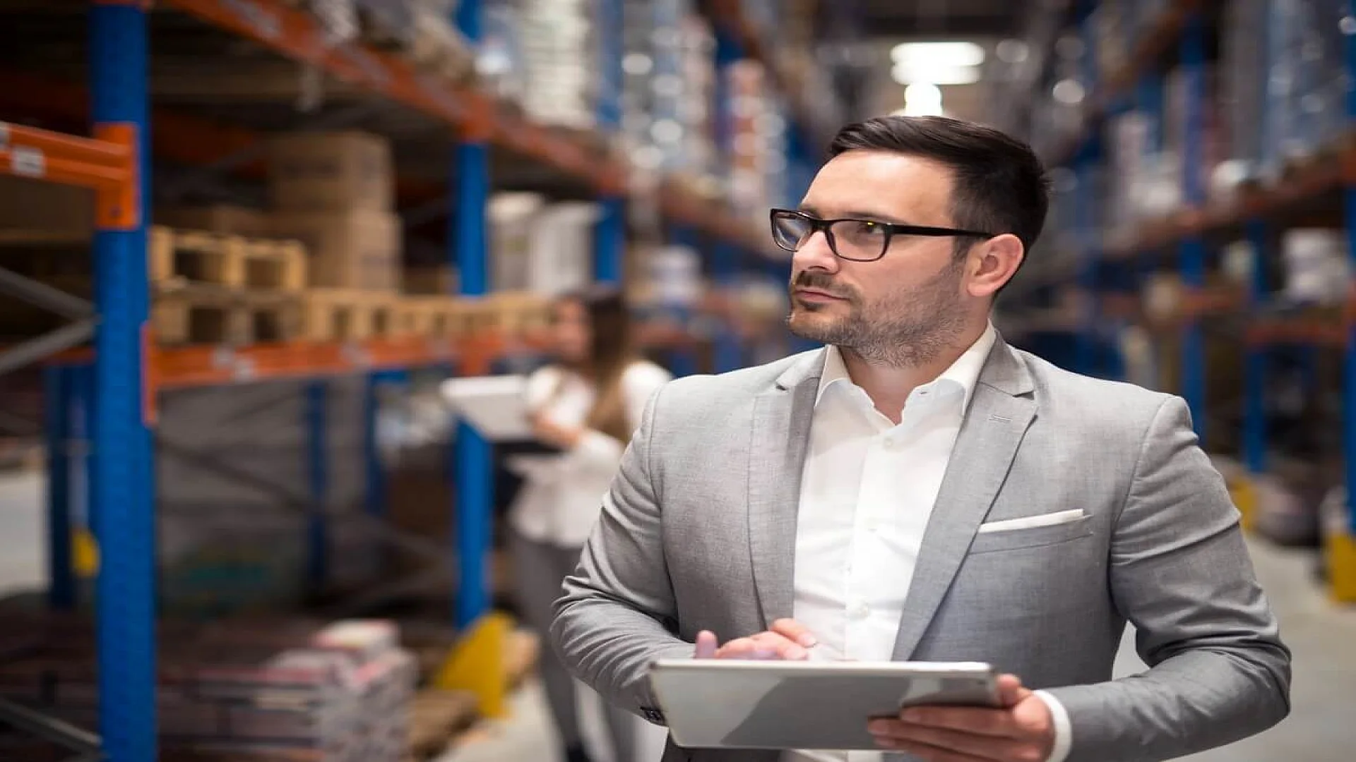 Successful Businessman Holding Tablet