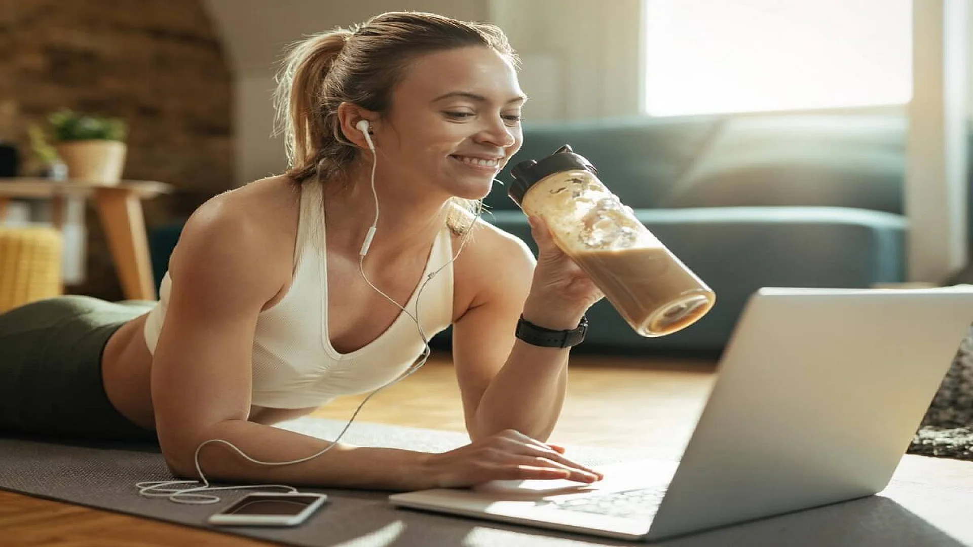 Sportswoman Drinking Smoothie